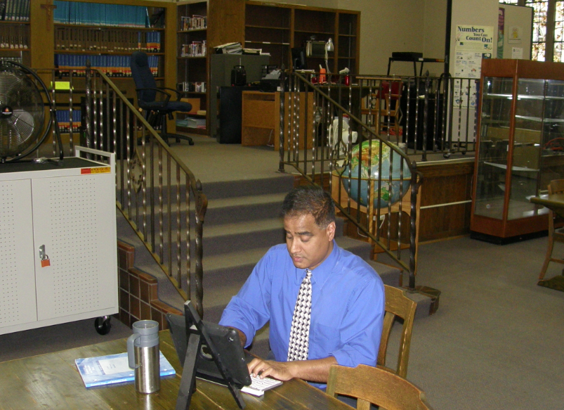 Mr. Bhatti hard at work in the library
