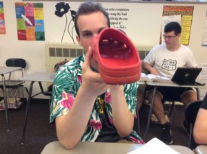 Robby shows the inside of his shoe to prove that it supplies quality arch support.