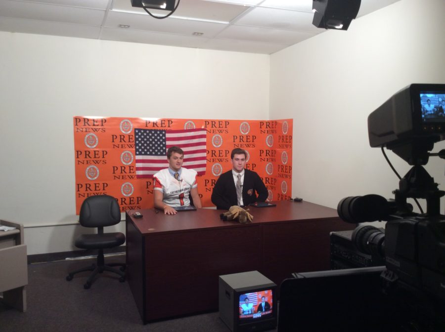 Trey Deitrick (Left) and Luke Baloga (Right) anchor a news broadcast 