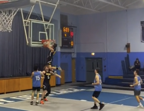 Prep seniors’ assist dunk during CYO game goes viral
