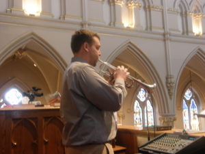 Mr. Malec playing trumpet at the cathedral